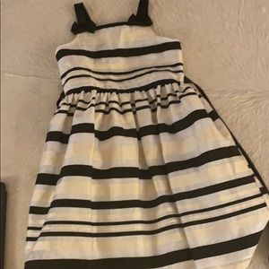 Girls size 12 black, gold and white dress.